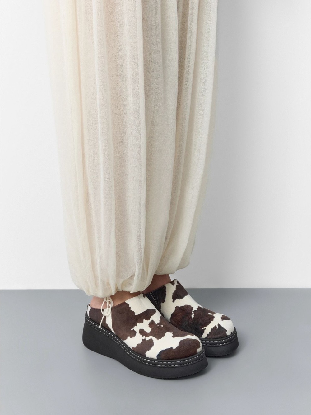 Miista Cow Print Faux Suede Platform Clogs